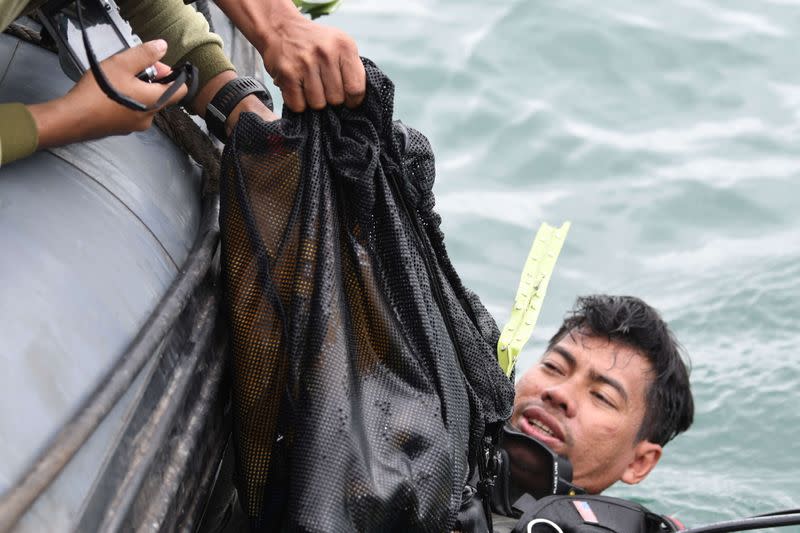 Sriwijaya Air Flight SJ182 plane crash recovery off Jakarta coast