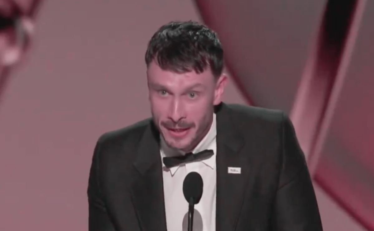 Gadd accepting his writing Emmy (ABC)