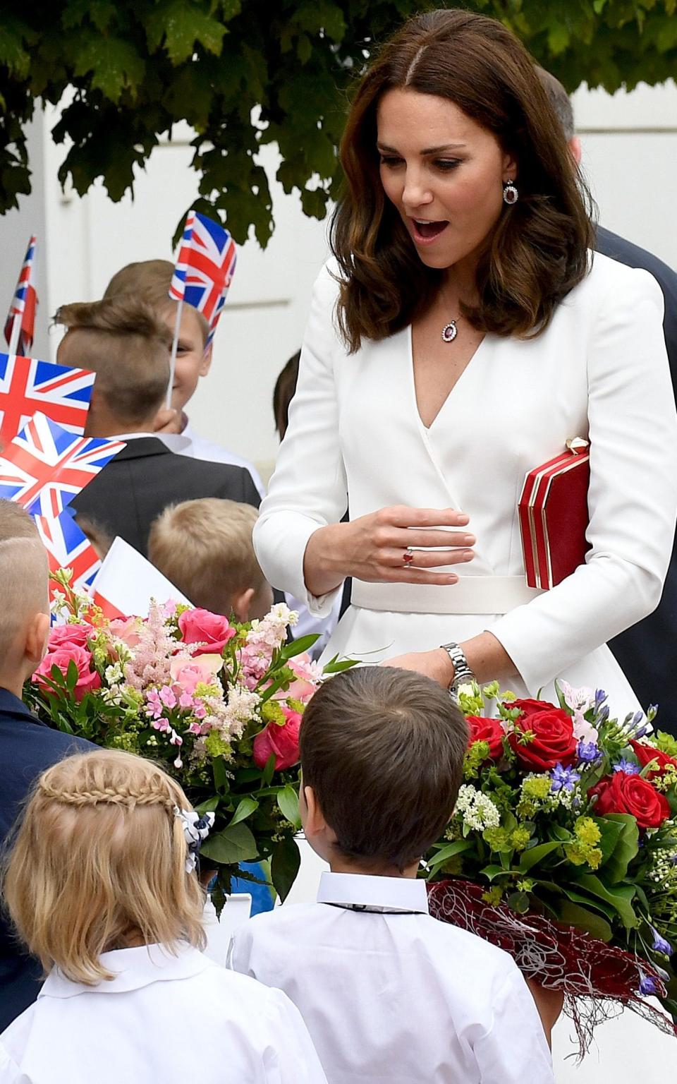 The Duchess of Cambridge meets children in Warsaw - Credit: JANEK SKARZYNSKI/AFP