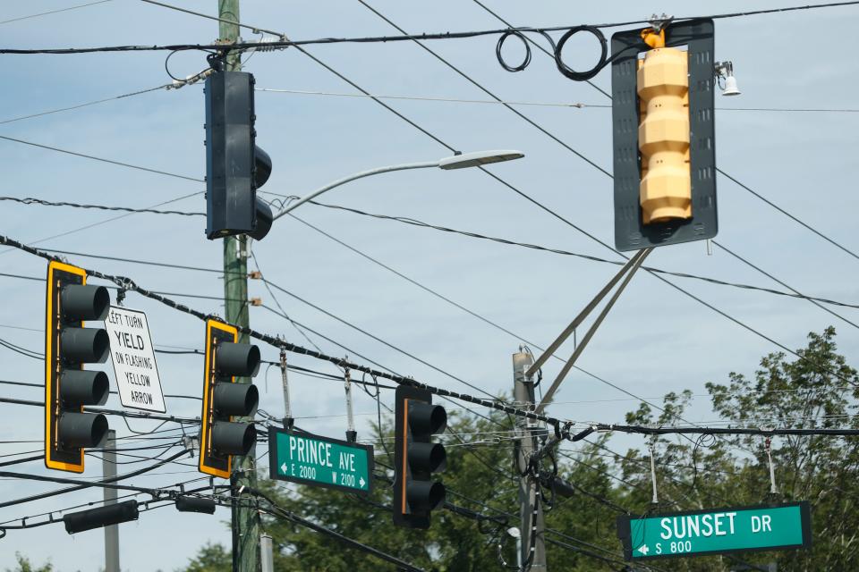 Disabled traffic lights on Prince Avenue following a severe storm in Athens, Ga., on Friday, July 21, 2023.