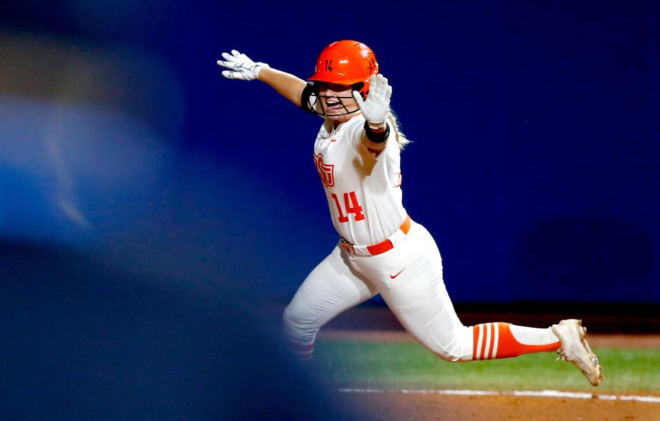 OSU's Karli Petty rounds the bases after hitting a home run in the sixth inning against Arizona on Thursday.