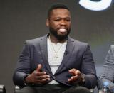 <p>50 Cent offers up a modern, tailored beard.</p>