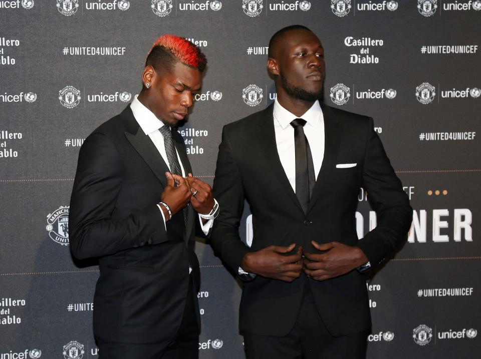 (From left) Paul Pgba and Stormzy at the United for Unicef Gala Dinner, 2017. (Credit: REX)