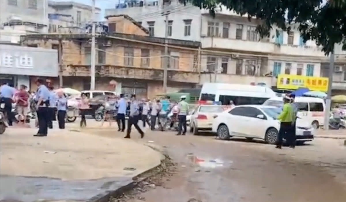 A police cordon is placed in the aftermath of a stabbing attack at a kindergarten in Lianjiang county, Guangdong province (Video obtained via REUTERS)