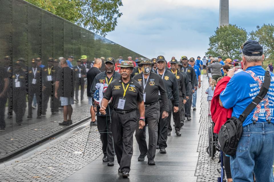 Veterans visit the Vietnam War Memorial in Washington, D.C., on Aug. 7, 2023, Purple Heart Day. Each of the veterans on the Honor Flight were recipients of Purple Hearts.