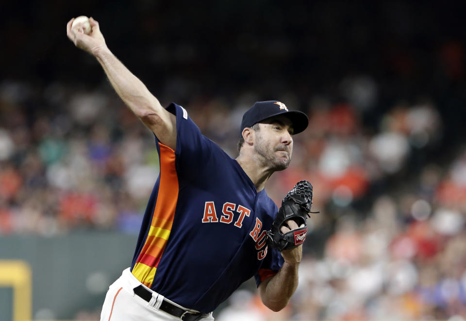 Houston Astros starting pitcher Justin Verlander throws during the first inning of a baseball game against the Seattle Mariners, Sunday, Aug. 4, 2019, in Houston. (AP Photo/Michael Wyke)