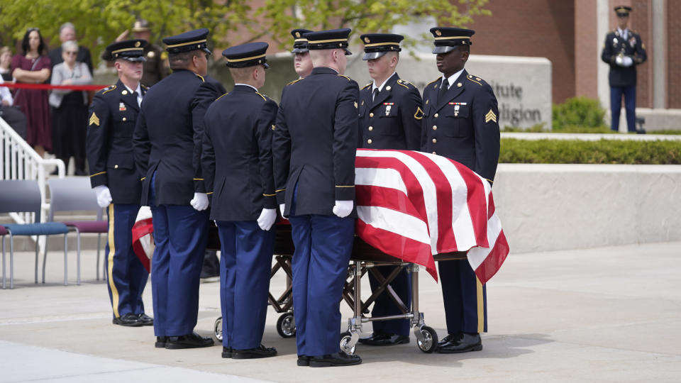 Members of the Utah Army National Guard stand at attention after carrying the casket of former Utah Sen. Orrin Hatch during funeral services at The Church of Jesus Christ of Latter-day Saints' Institute of Religion Friday, May 6, 2022, in Salt Lake City. Hatch, the longest-serving Republican senator in history and a fixture in Utah politics for more than four decades, died last month at the age of 88. (AP Photo/Rick Bowmer)