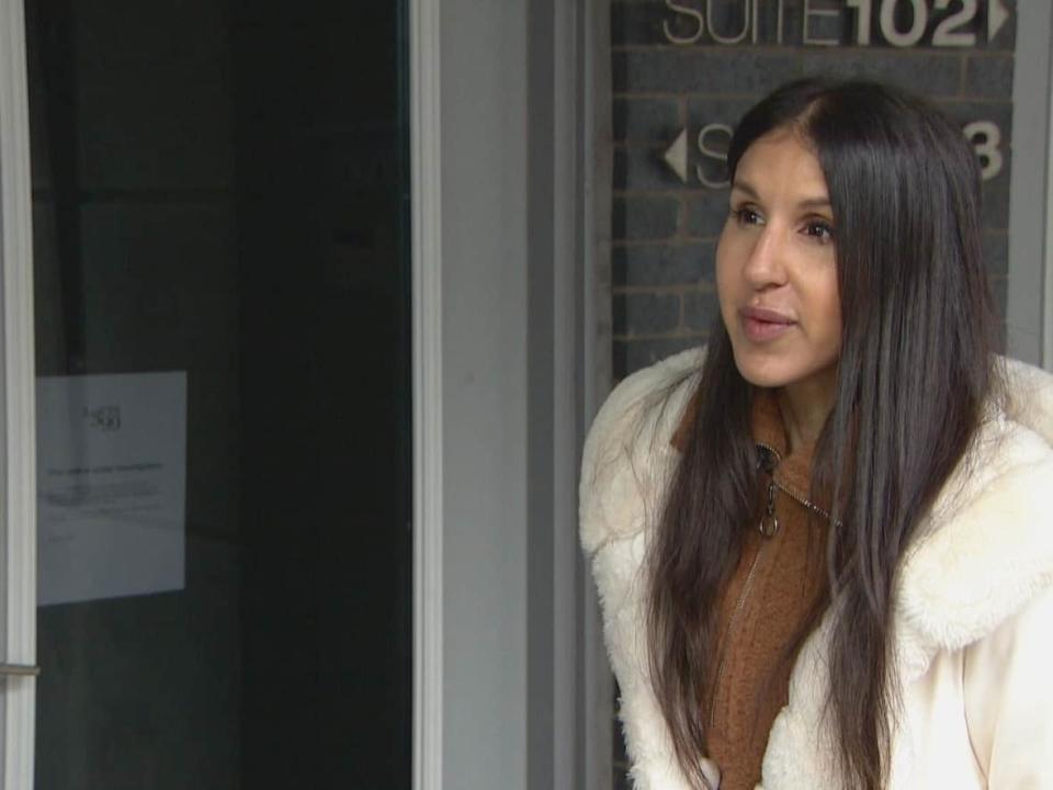 Condo owner Allison Rasquinha says the City of Toronto should conduct more due diligence before approving short-term rental applications. Rasquinha learned earlier this year that someone other than her approved tenant was able to obtain a short-term rental licence for her unit.  (Keith Burgess/CBC - image credit)