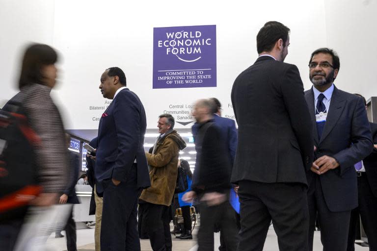 Participants are seen at the Congress Center during the World Economic Forum annual meeting on January 21, 2014 in Davos, Switzerland