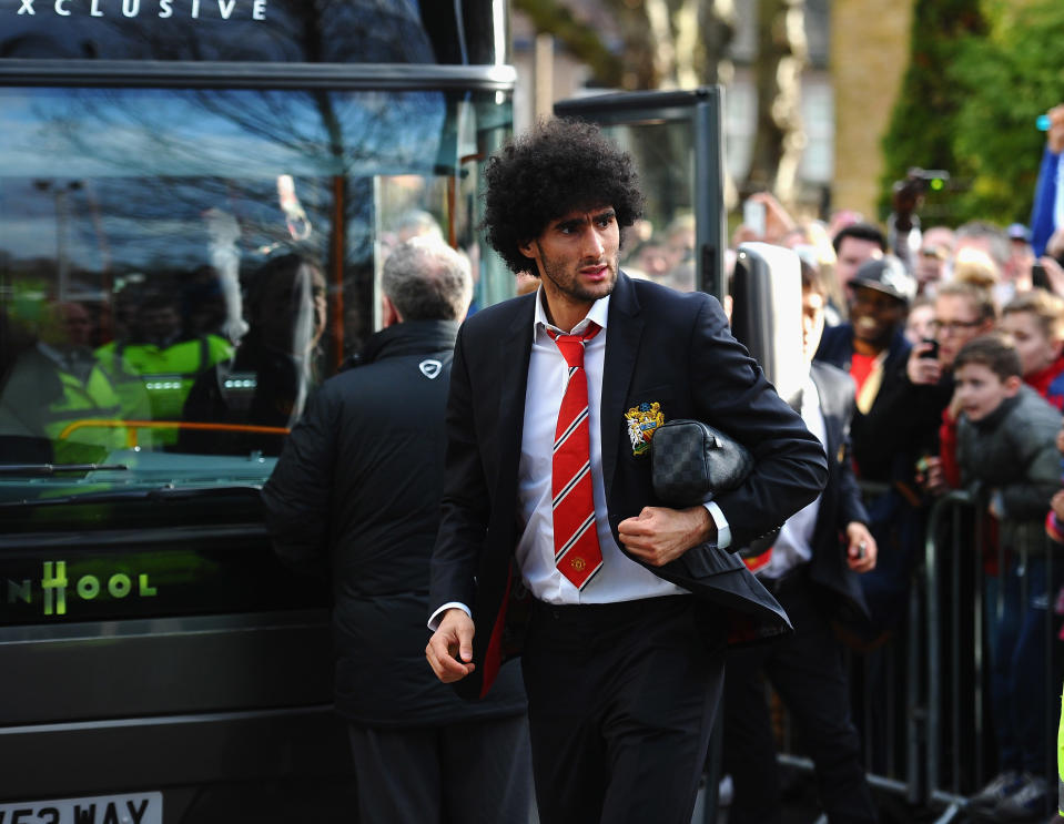 Marouane Fellaini gets off the team bus before a match against Crystal Palace.