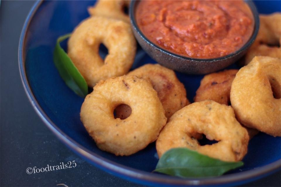 <p>Food Trails</p><p>All need is skinned black gram to make this fluffy, savory donut look-alike! It is absolutely delicious with some chutneys! </p><p><strong>Get the recipe: <a href="https://foodtrails25.com/2019/08/19/medu-vada/" rel="nofollow noopener" target="_blank" data-ylk="slk:Medu Vada;elm:context_link;itc:0;sec:content-canvas" class="link ">Medu Vada</a></strong></p>