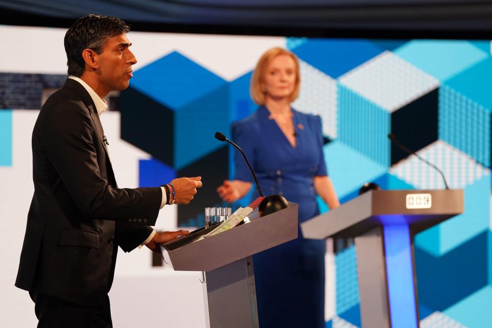 Rishi Sunak and Liz Truss take part in the BBC Leadership debate at Victoria Hall on 25 July 2022 in Hanley, England (Getty Images)