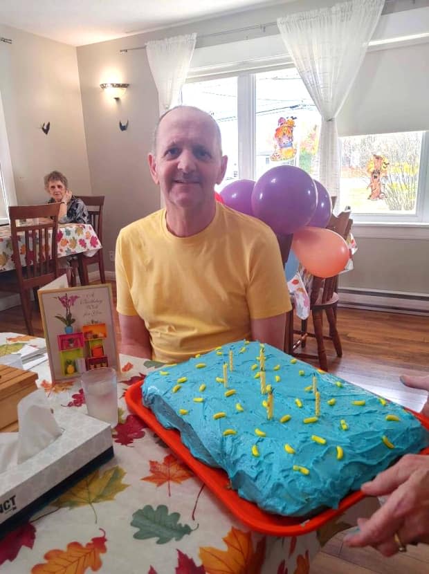 Roger Ellis on his birthday in 2020. According to his son Steve, Ellis has displayed symptoms of New Brunswick's mystery neurological disease for two years now. Steve Ellis is upset that residents only learned of the disease in a leaked email last month. (Submitted by Steve Ellis - image credit)