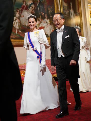 <p>Yui Mok-WPA Pool/Getty</p> Kate Middleton and Choo Kyung-ho Deputy Prime Minister of South Korea enter the state banquet at Buckingham Palace on Nov. 21, 2023.