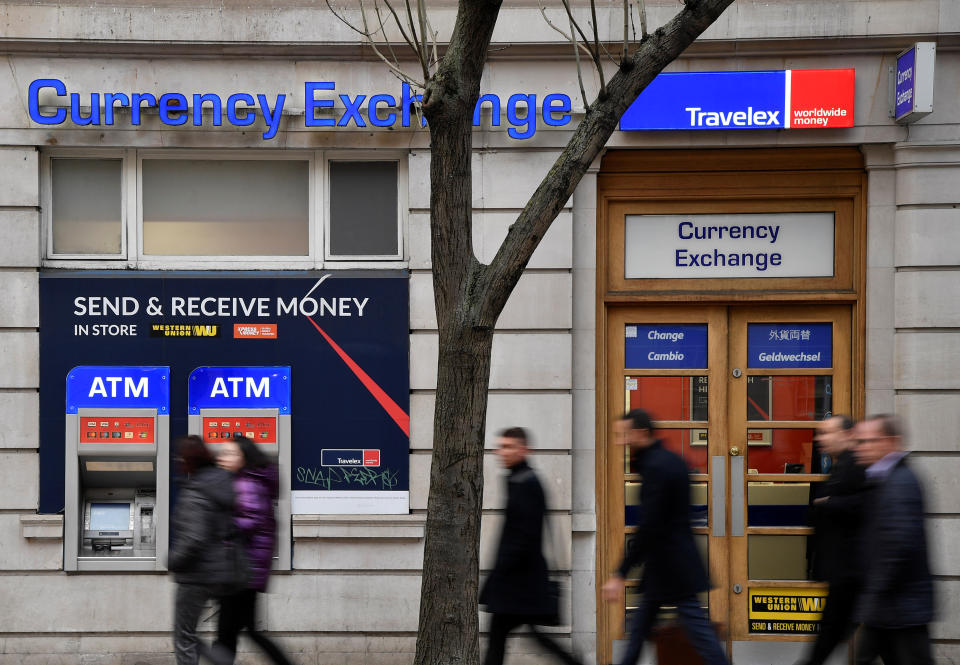 People walk past a branch of Travelex Currency Exchange in London, Britain, January 8, 2020. REUTERS/Toby Melville