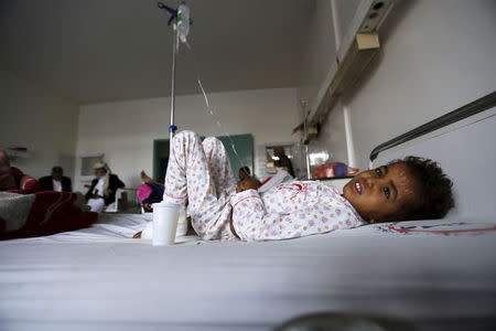 Marwan Ali Rajeh, 7, lies on a hospital bed while being treated for injuries he suffered from a Saudi-led air strike that killed two of his brothers near Sanaa, Yemen, June 24, 2015. REUTERS/Khaled Abdullah