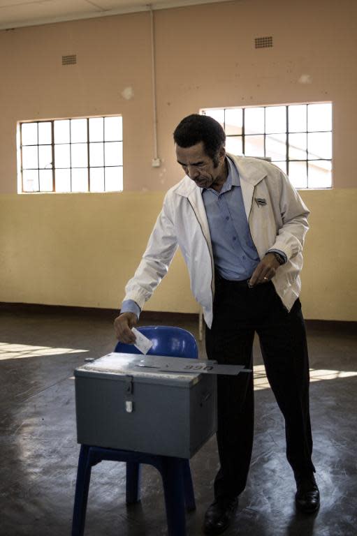 Botswana's President Ian Khama casts his ballot at a polling station in his hometown Serewe, on October 24, 2014