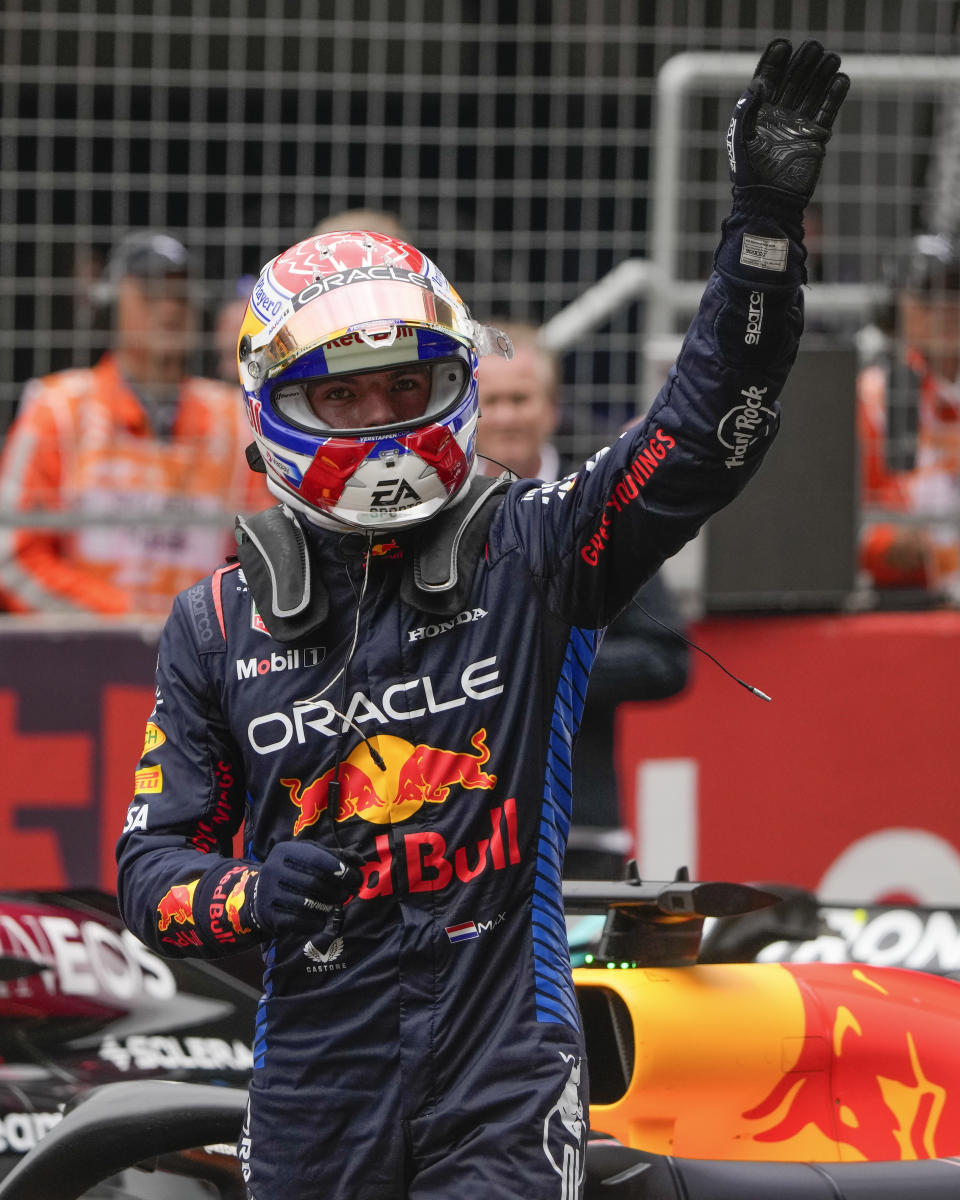 Red Bull driver Max Verstappen of the Netherlands waves after winning the sprint race at the Chinese Formula One Grand Prix at the Shanghai International Circuit, Shanghai, China, Saturday, April 20, 2024. (AP Photo/Andy Wong)