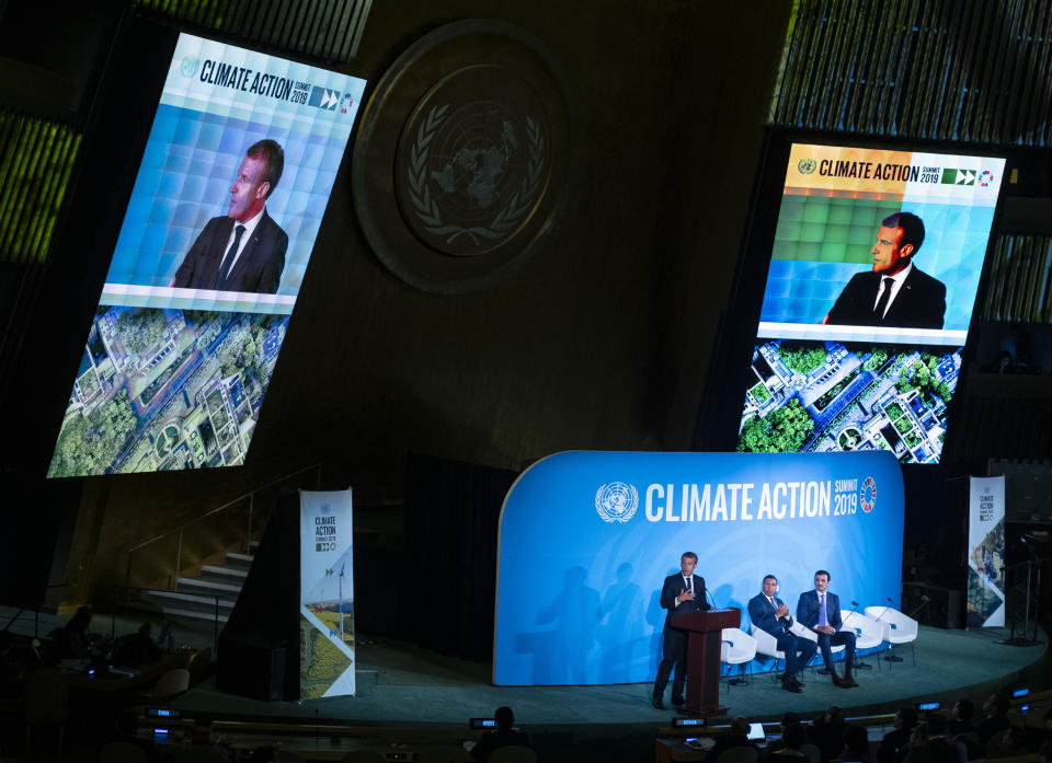 French President Emmanuel Macron speaks during the Climate Action Summit 2019 at the 74th session of the United Nations General Assembly, at U.N. headquarters, Monday, Sept. 23, 2019. Emir of Qatar, Sheikh Tamim bin Hamad Al Thani is center and Jamaica Prime Minister Andrew Holness is right. (AP Photo/Craig Ruttle)