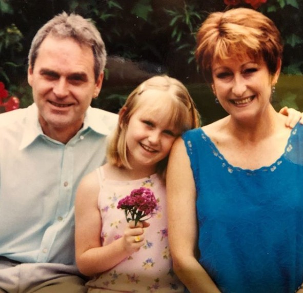 A photo of Lynne McGranger, her partner Paul McWaters and their daughter Clancy McWaters.