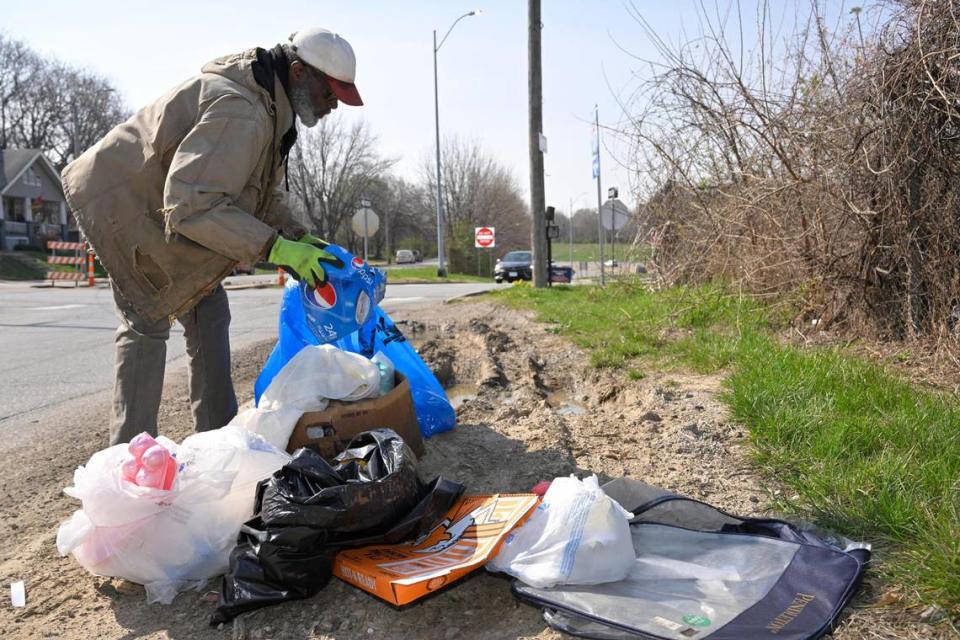 Robert Quarles of Kansas City spent time Tuesday, April 4, 2023, picking up trash dumped on the side of the road close to his home near E. 23rd Street and Askew Avenue, just off Interstate 70, in Kansas City. For the past 10 years, Quarles has been voluntarily picking up trash and debris in Kansas City. He gets rolls of 150 blue trash bags from the city.