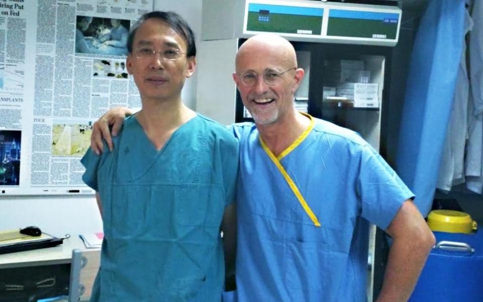 Dr Xiaoping Ren and Professor Sergio Canavero, who believes a brain will be transplanted in the near future - Ooom