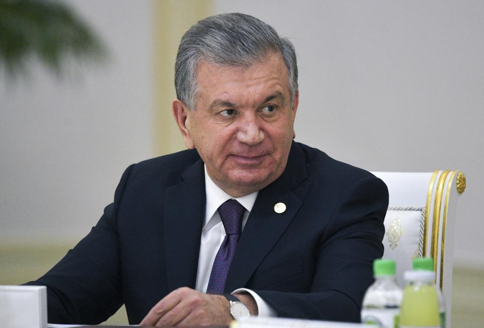 FILE - In this file Friday, Oct. 11, 2019 file photo, Uzbekistan's President Shavkat Mirziyoyev attends the meeting of the heads of CIS states in Ashgabat, Turkmenistan. Uzbekistan's president is expected to win a new term by a landslide against weak competition in an election Sunday. Shavkat Mirziyoyev has relaxed many of the policies of his dictatorial predecessor but has made little effort at political reform. (Alexei Druzhinin, Sputnik, Kremlin Pool Photo via AP, File)