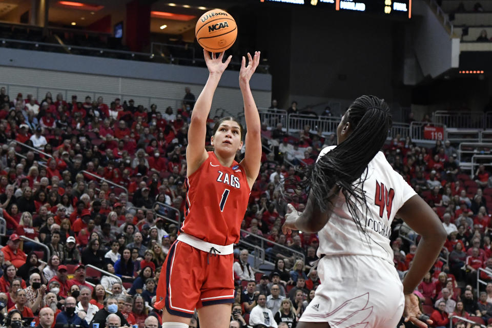 Gonzaga forward Anamaria Virjoghe (1) shoots over Louisville forward Olivia Cochran (44) during the first half of a women's NCAA tournament college basketball second-round game in Louisville, Ky., Sunday, March 20, 2022. (AP Photo/Timothy D. Easley)