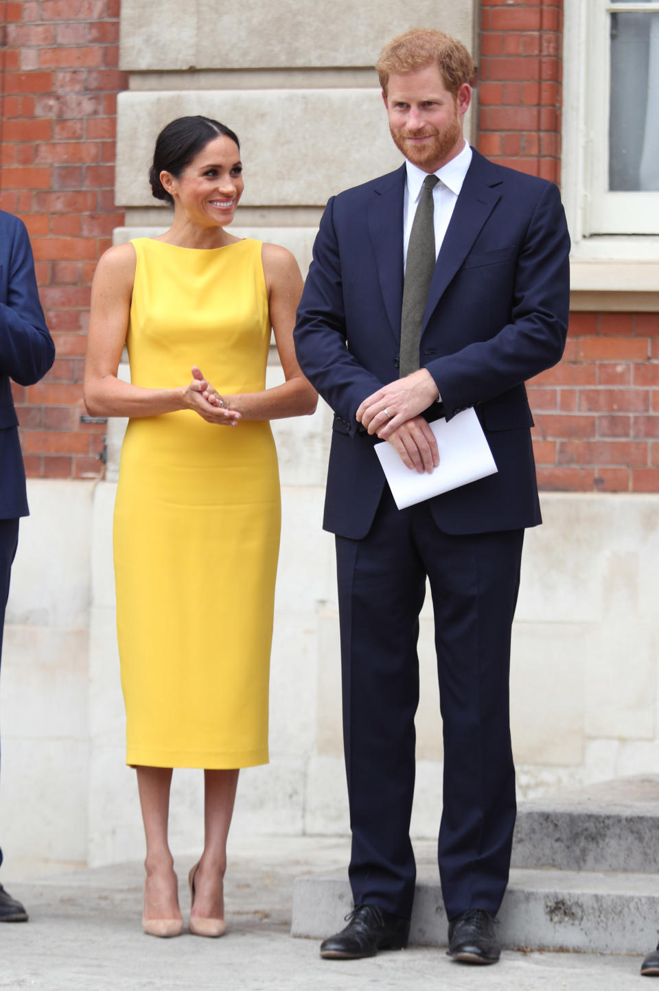 The Duchess of Sussex broke her neutral colour palette with a punchy yellow Brandon Maxwell dress at the Commonwealth Youth Forum [Photo: Getty]