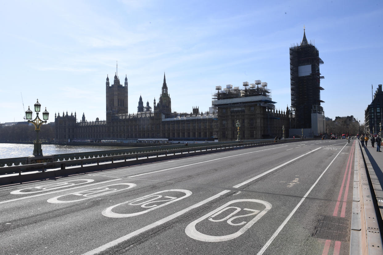 An empty Westminster Bridge and the Houses of Parliament in Westminster, London, the day after Prime Minister Boris Johnson put the UK in lockdown to help curb the spread of the coronavirus