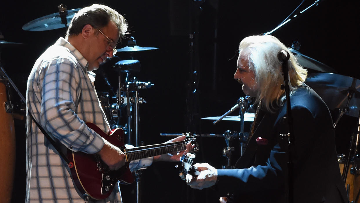  Vince Gill (left) and Joe Walsh perform onstage with the Eagles at The Grand Ole Opry in Nashville, Tennessee on October 29, 2017. 
