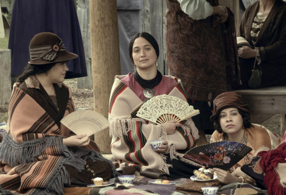 This image released by Apple TV+ shows, from left, JaNae Collins, Lily Gladstone, and Cara Jade Myers in a scene from "Killers of the Flower Moon." (Melinda Sue Gordon/Apple TV+ via AP)