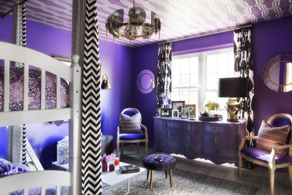 In this photo provided by Brian Patrick Flynn the designer Flynn created a tween girl's room for HGTV.com that features the a shade of red-violet similar to the Pantone color of the year for 2014. Flynn suggests pairing the color with neutrals like white and black to make it a bit lighter and more playful. (AP Photo/Brian Patrick Flynn/HGTV.com, Sarah Dorio)