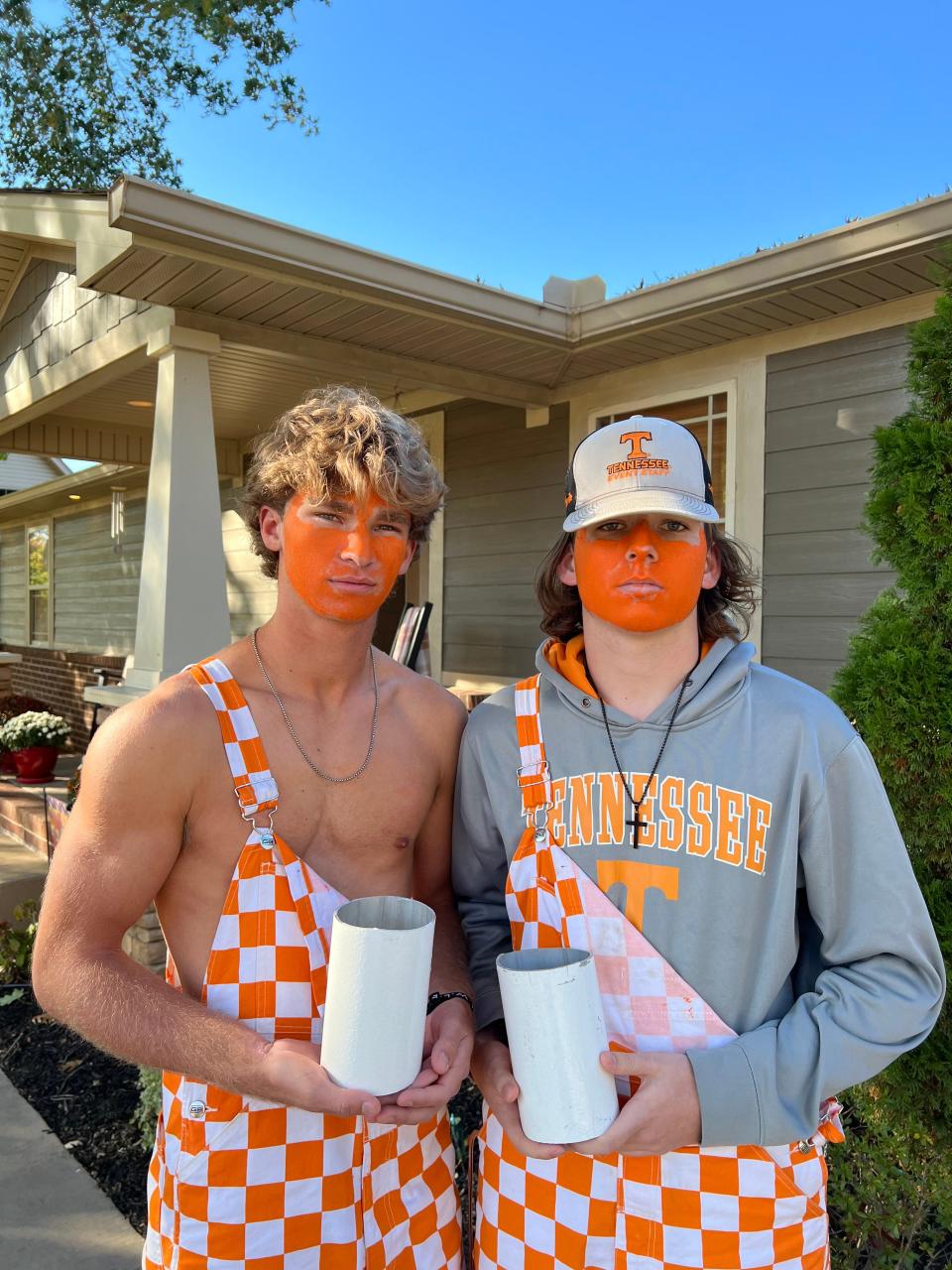 Eli Austin, left, and Eli Ferguson show the pieces of the south end zone goal post they came away with after Tennessee upset Alabama on Saturday, Oct. 15, 2022, at Neyland Stadium. Austin and Ferguson are seniors at Central Magnet School in Murfreesboro, Tennessee.