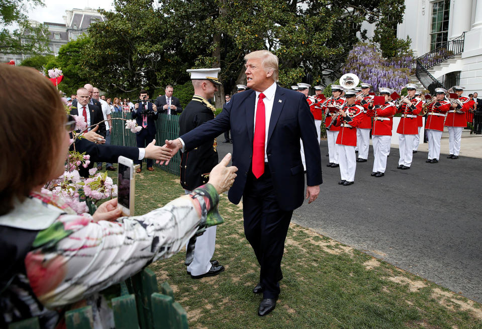 President Trump greets people at White House Easter Egg Roll