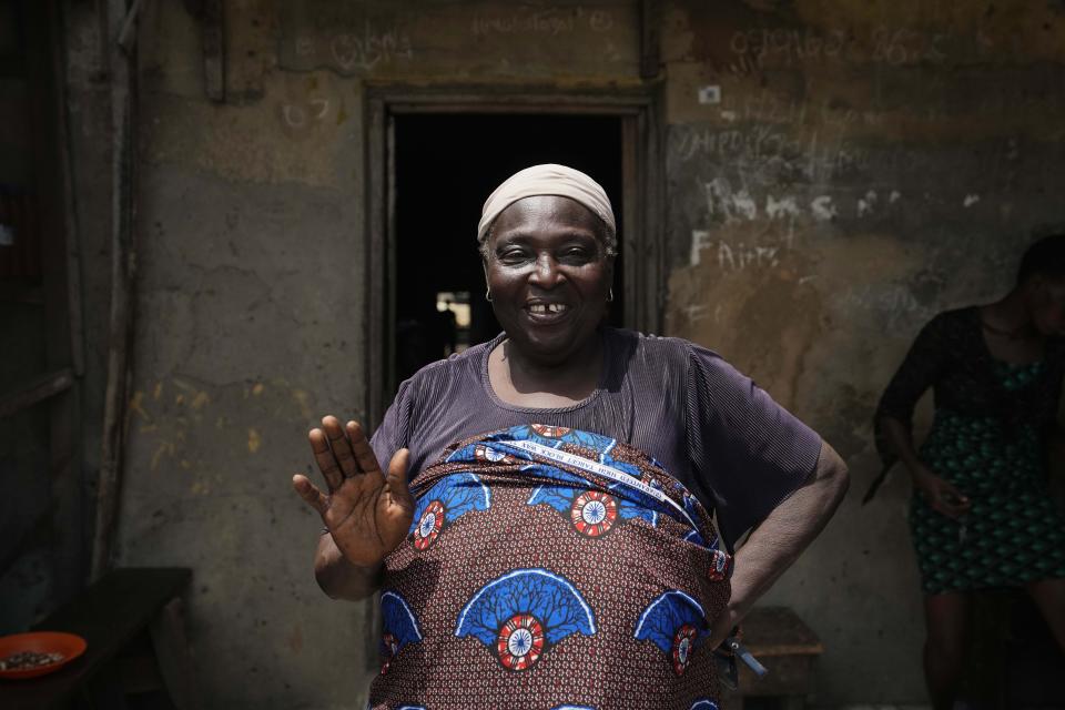 Funmilayo Kotun, 66-years-old, a malaria patient is photographed outside her house in Makoko neighbourhood of Lagos, Nigeria, Saturday, April 20, 2024. When cases of locally transmitted malaria were found in the United States last year, it was a reminder that climate change is reviving the threat, or broadening the range, of some diseases. But across the African continent malaria has never left.(AP Photo/Sunday Alamba)