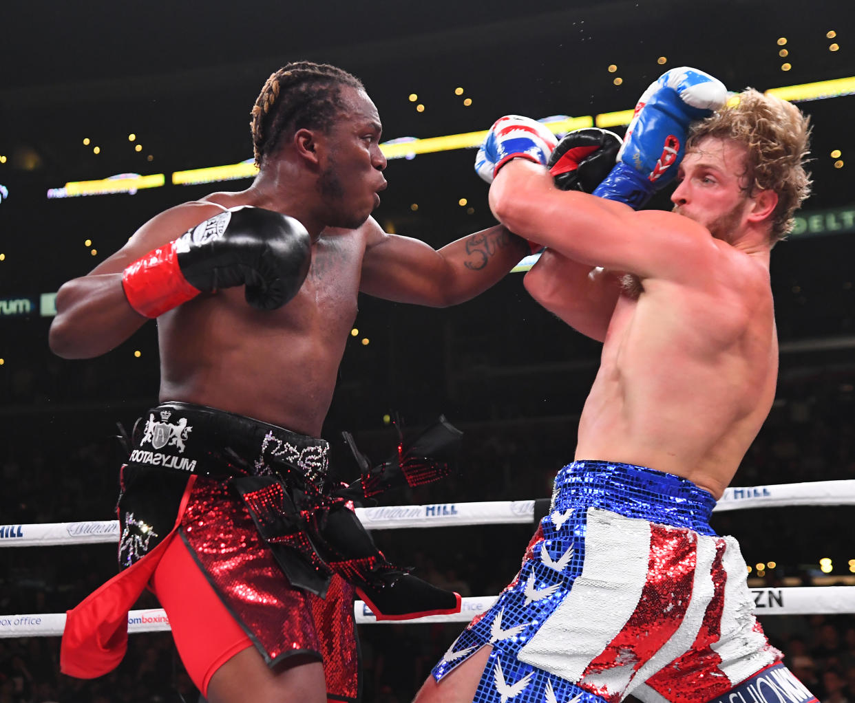 LOS ANGELES, CA - NOVEMBER 09: Logan Paul (red/white/blue shorts) and KSI (black/red shorts) exchange punches during their pro debut fight at Staples Center on November 9, 2019 in Los Angeles, California. KSI won by decision. (Photo by Jayne Kamin-Oncea/Getty Images)