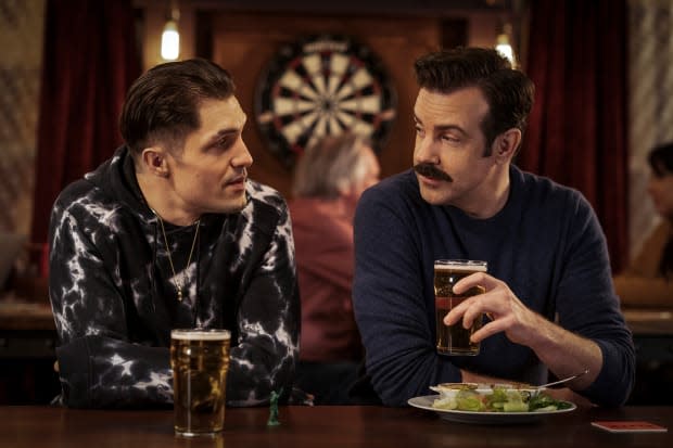 Jamie Tartt (Phil Dunster) unveils a new look over pint with Ted.<p>Photo: Courtesy of Apple TV+</p>