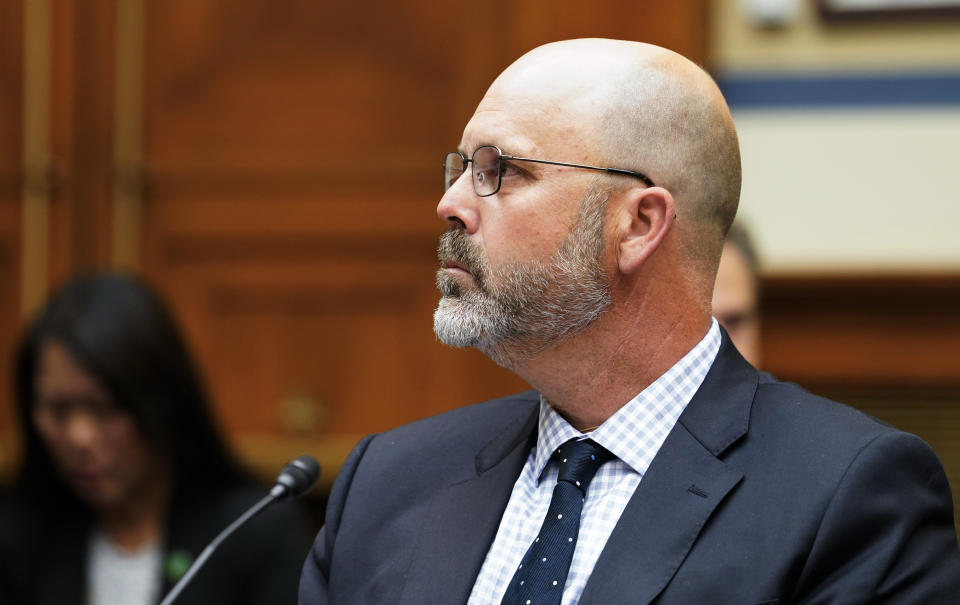 FILE - Ryan Busse, senior advisor at Giffords Law Center, listens during a House Committee on Oversight and Reform hearing examining the practices and profits of gun manufacturers, July 27, 2022, on Capitol Hill in Washington. The former firearms industry executive is seeking the Democratic nomination to challenge first-term Montana Republican Gov. Greg Gianforte in the 2024 election. (AP Photo/Mariam Zuhaib, File)