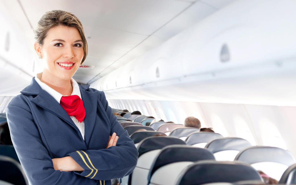 <em>Another</em> smiling flight attendant?