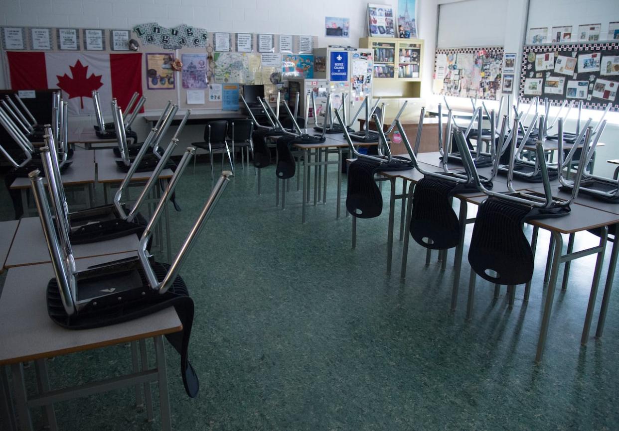 The Saskatchewan Teachers' Federation says it is consulting with its members about whether to enter into binding arbitration with the government. (Jonathan Hayward/The Canadian Press - image credit)