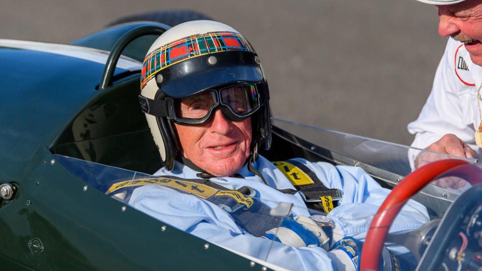 Jackie Stewart back behind the wheel for the Goodwood Motor Circuit’s 2019 Goodwood Revival in the UK. - Credit: Photo by Nick Harvey, courtesy of Rolex.