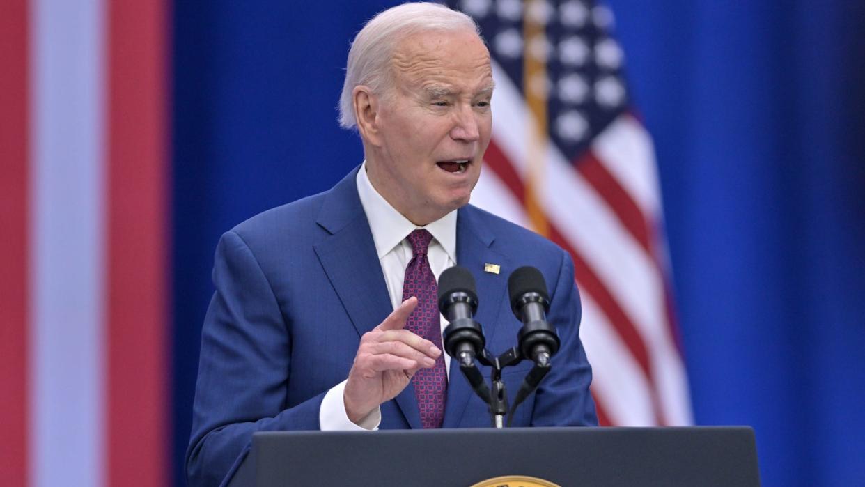 President Joe Biden talks about plans to tax corporations and those making over $400,000 in an effort to lower the country's financial deficit during a March 11 speech in New Hampshire.