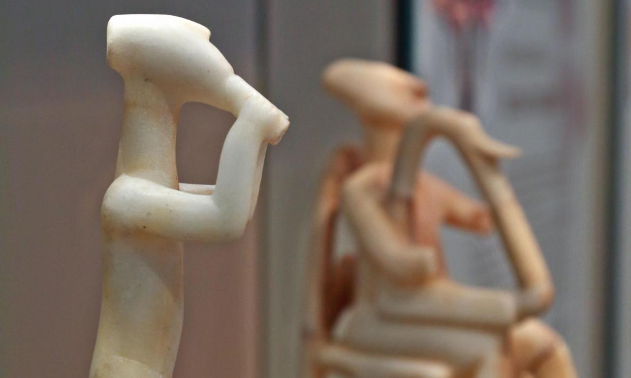 <span>And on the flute … a Cycladic figure playing an instrument. </span><span>Photograph: Ioannis Mantas/Alamy</span>