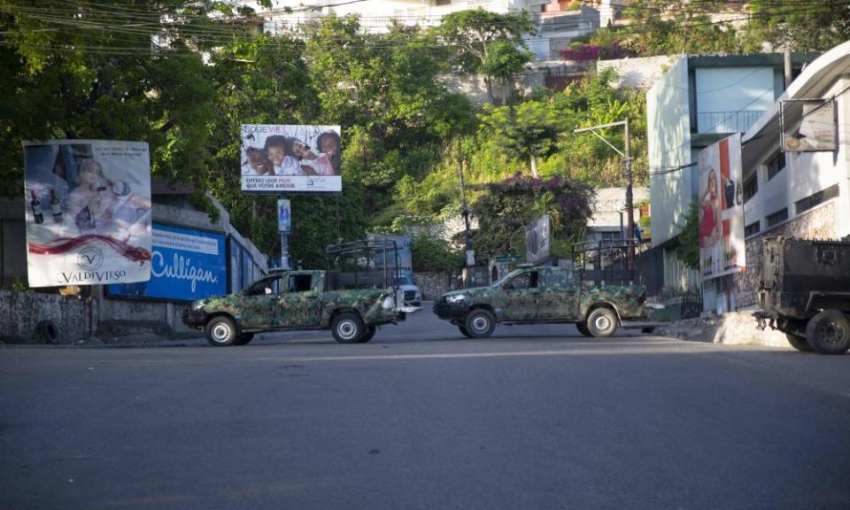 Military vehicles block the entrance to the neighbourhood where Jovenel Moïse lived