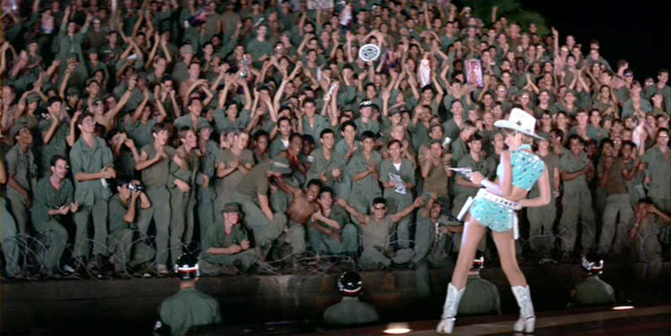 LOS ANGELES - AUGUST 15: The movie &quot;Apocalypse Now&quot;, directed by Francis Ford Coppola. Seen here in foreground, facing troops, Cynthia Wood as Carrie Foster, Playmate of the Year. Initial theatrical release August 15, 1979. Screen capture. Paramount Pictures. (Photo by CBS via Getty Images)