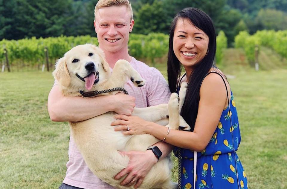 Charlotte food blogger Shuang Shuang Liang with her husband, Tom, and their dog, Muffin.