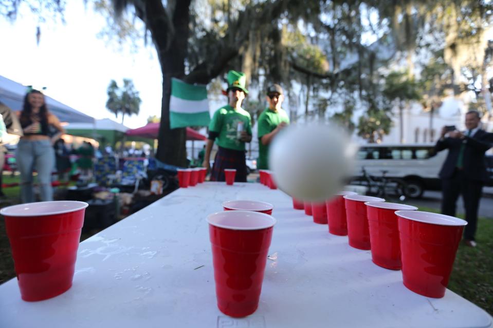 FILE: An early morning game of Beer Pong in Lafayette Square. The liquid gold is a cornerstone of St. Patrick's Day, but partygoers should be keeping an eye for porta-potties and other bathroom options for when nature calls.