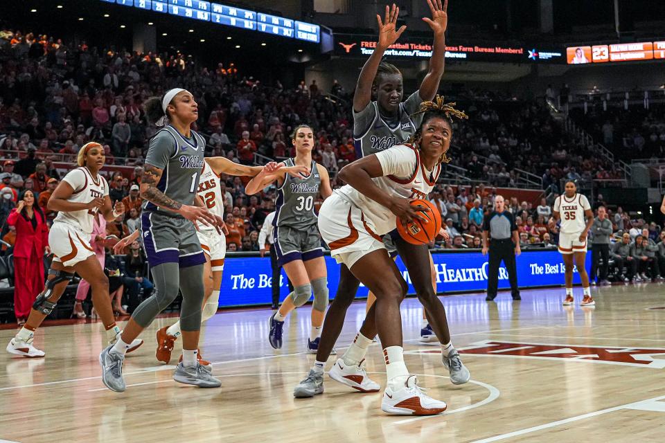 Texas forward DeYona Gaston, right, thinks she's at about 85-87% back from an ankle injury. The Pearland product is eager to return home for Wednesday night's Texas-Houston game at Houston.