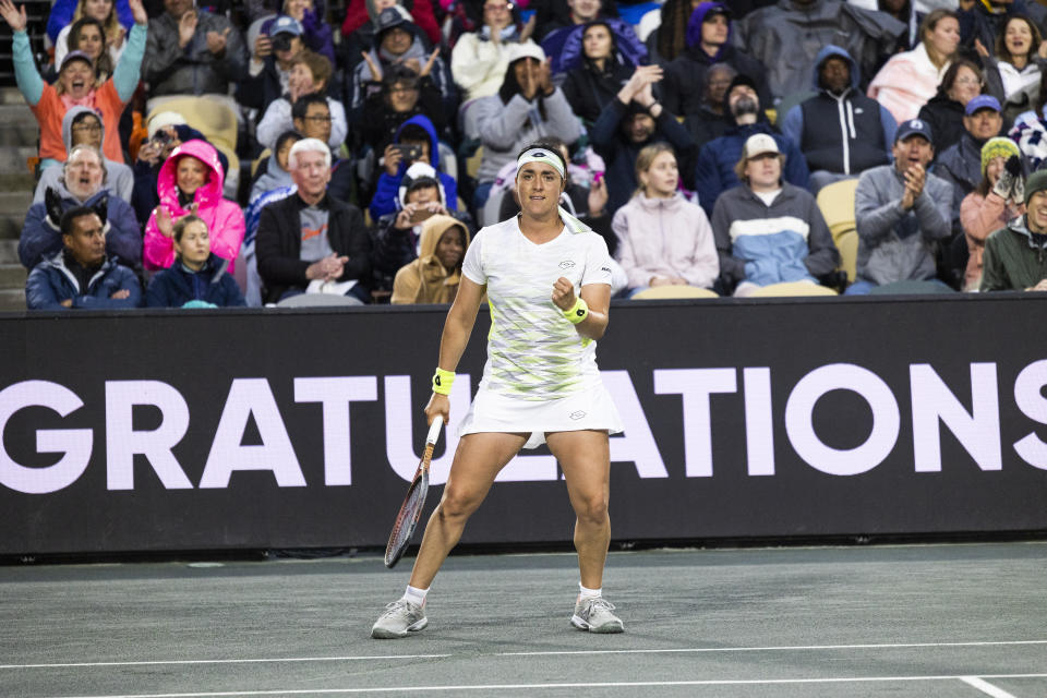 Ons Jabeur, of Tunisia, celebrates after defeating Daria Kasatkina, of Russia, in a semifinal match at the Charleston Open tennis tournament in Charleston, S.C., Saturday, April 8, 2023. (AP Photo/Mic Smith)